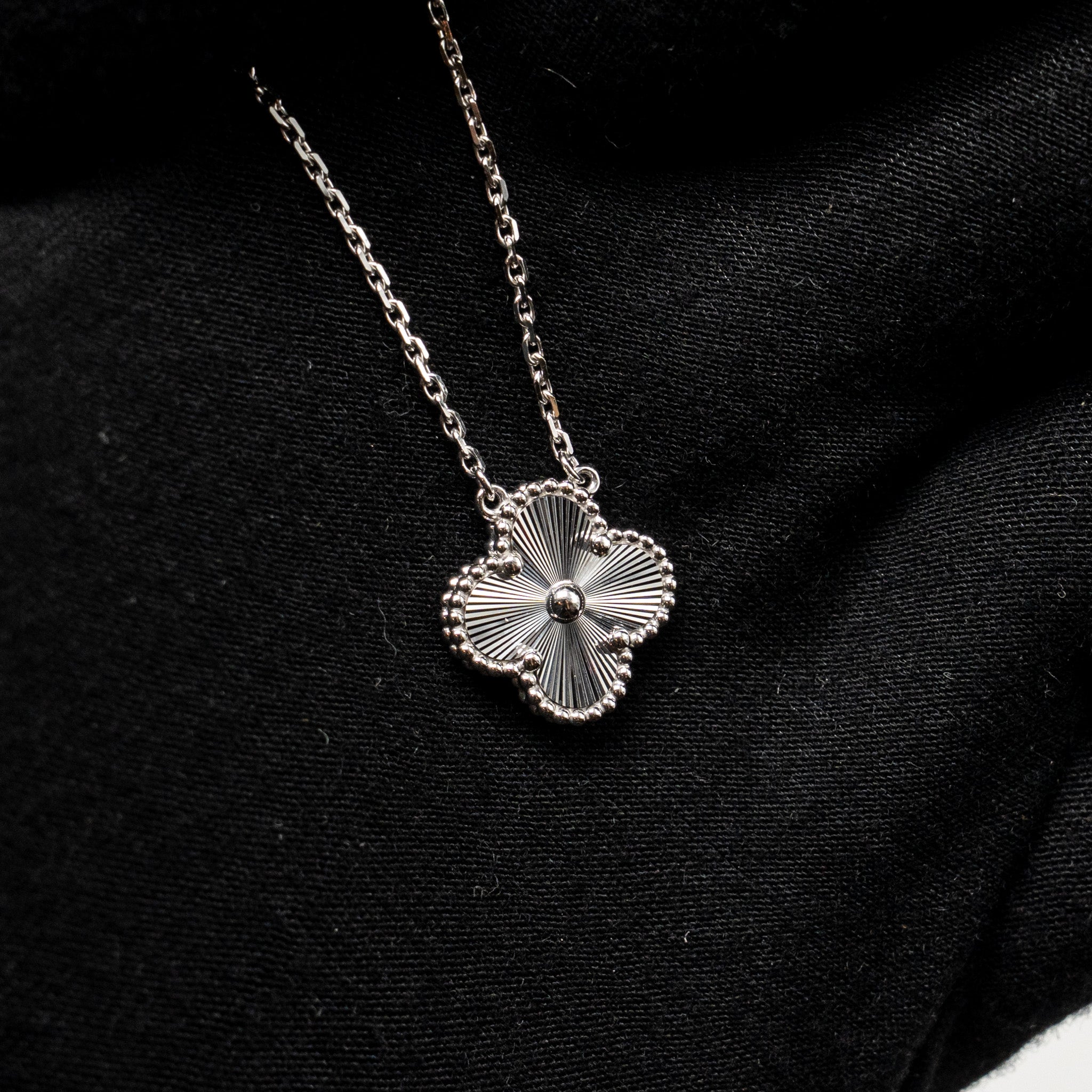 VAN CLEEF & ARPELS VINTAGE ALHAMBRA PENDANT GUILLOCHE WHITE GOLD