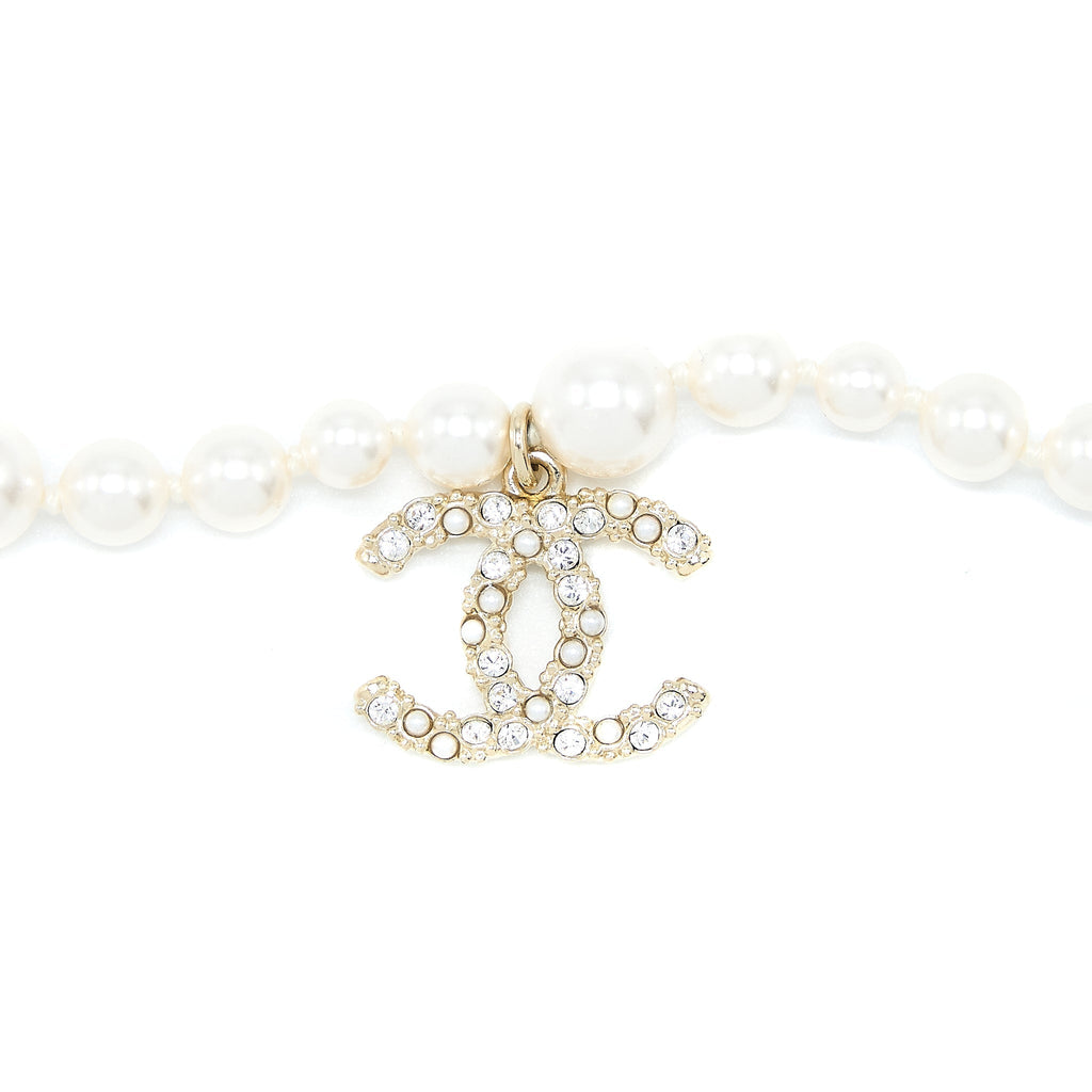 CHANEL CC LOGO DROPPED BRACELET PEARL/CRYSTAL LIGHT GOLD TONE