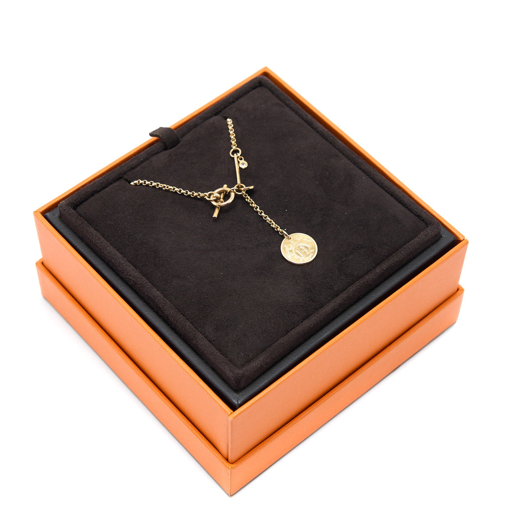 HERMES EX-LIBRIS PENDANT ROSE GOLD WITH ONE DIAMOND