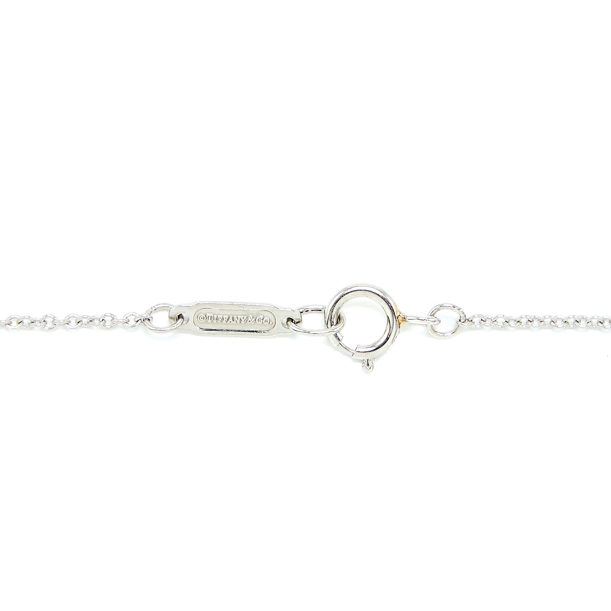 TIFFANY & CO. SCHLUMBERGER SIXTEEN STONE CIRCLE PENDANT 18K GOLD TONE