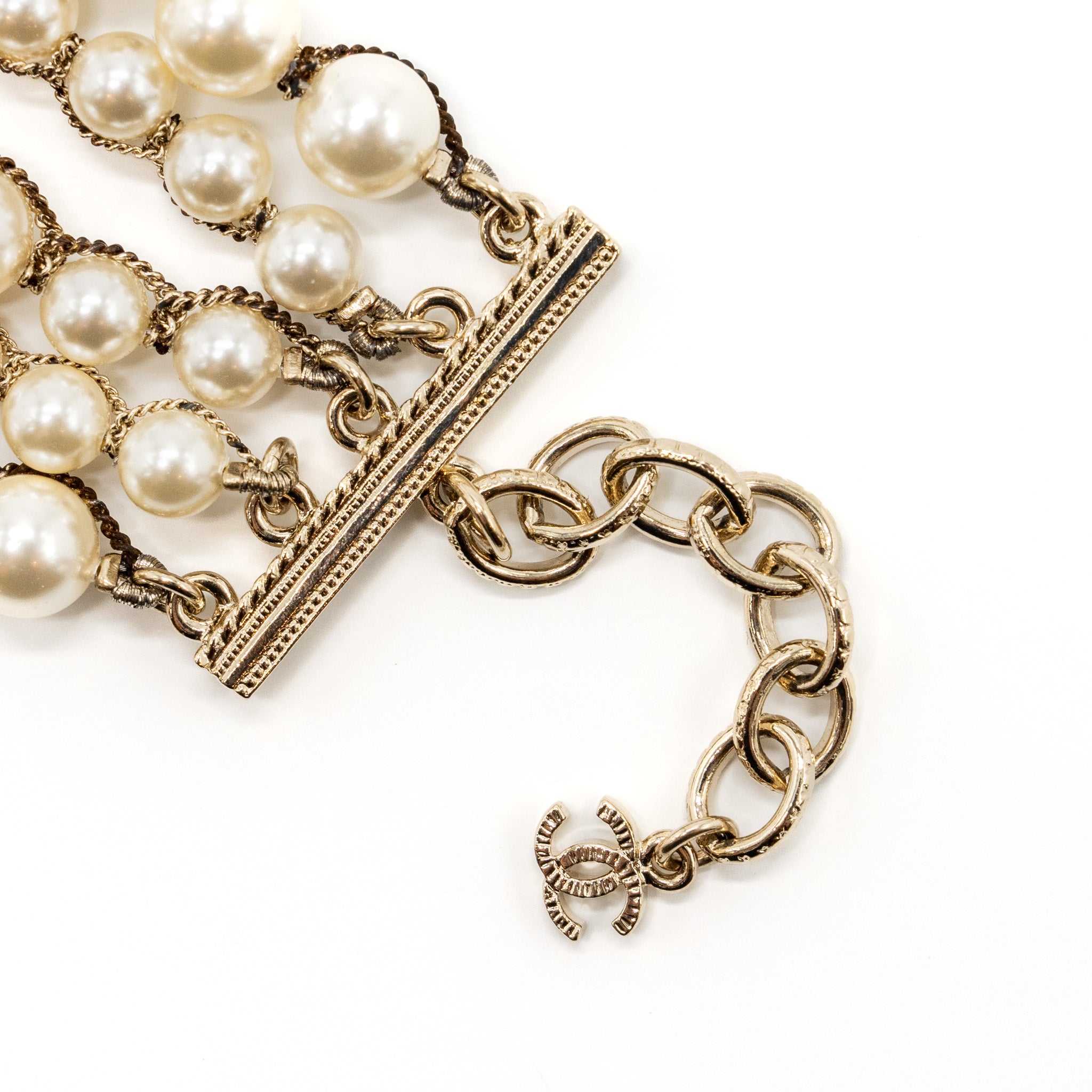 CHANEL PEARL AND CC LOGO BRACELET LIGHT GOLD TONE