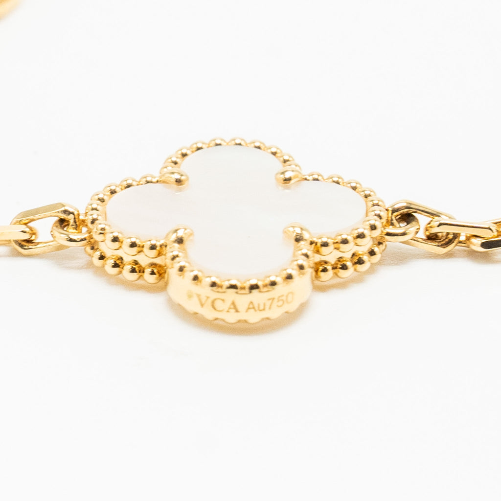 VAN CLEEF AND ARPELS VINTAGE ALHAMBRA 20-MOTIF LONG NECKLACE YELLO GOLD, WHITE MOTHER OF PEARL