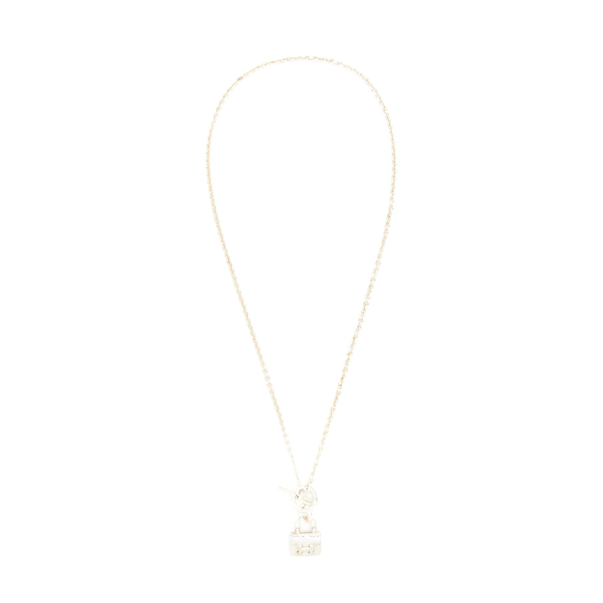 HERMES AMULETTES CONSTANCE PENDANT STERLING SILVER WITH TOGGLE CLOSURE