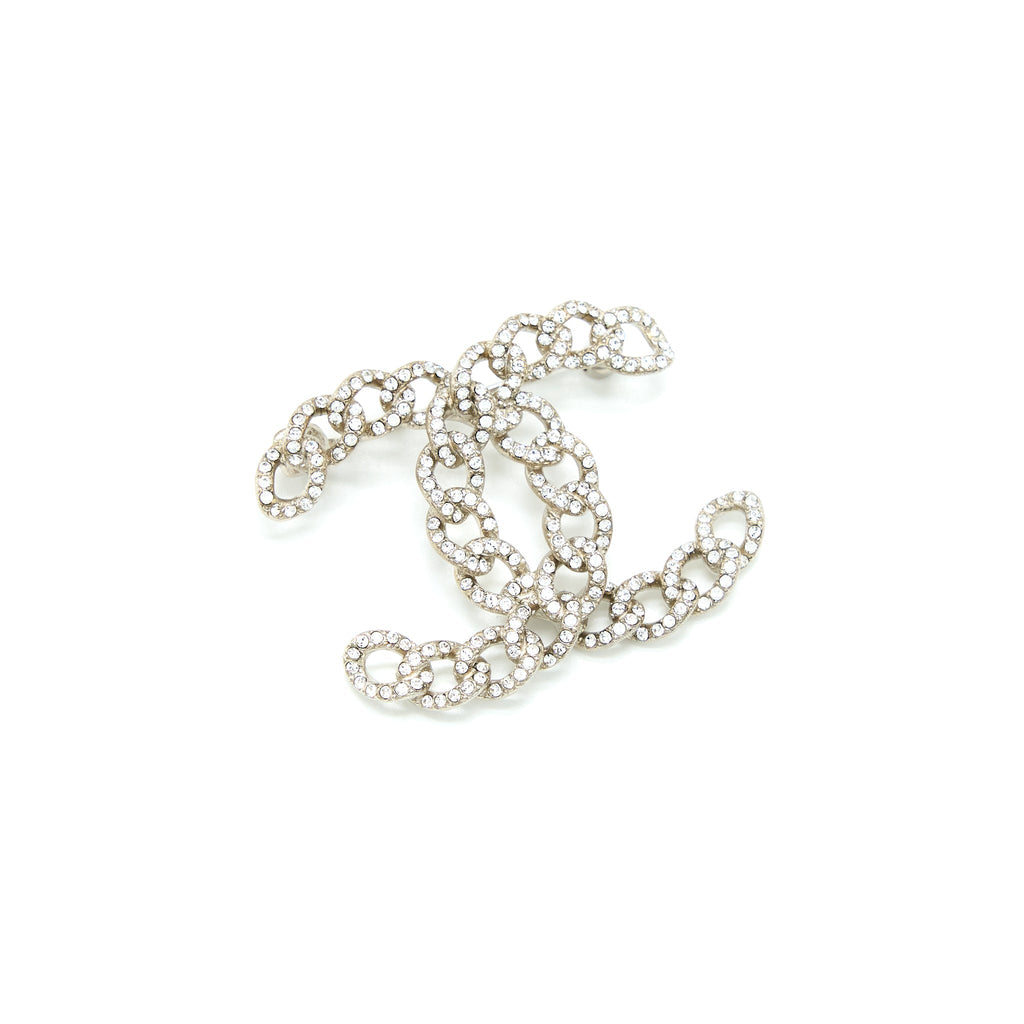 CHANEL TWISTED CC CRYSTAL LOGO BROOCH SHW