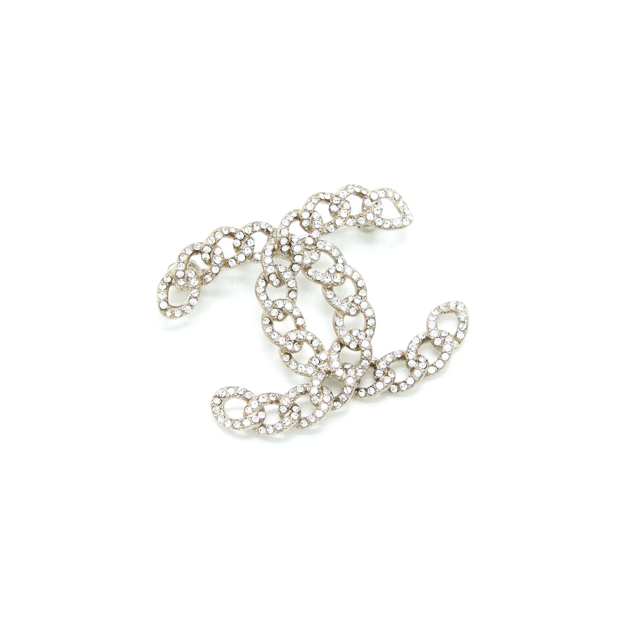 CHANEL TWISTED CC CRYSTAL LOGO BROOCH SHW