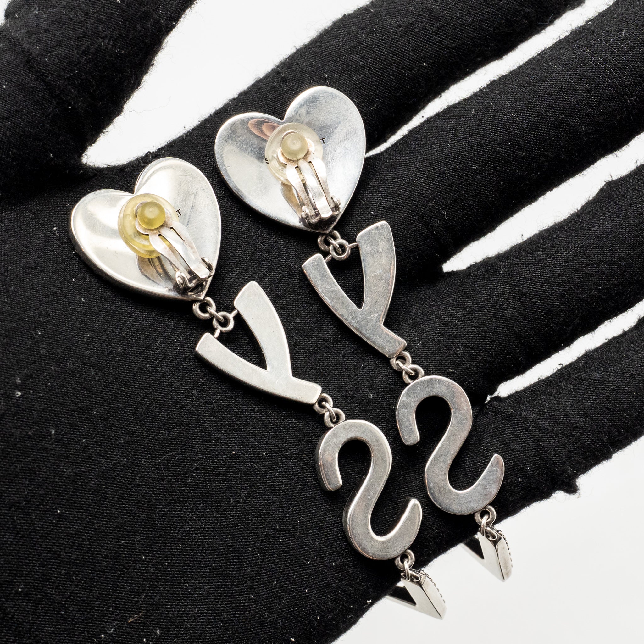 SAINT LAURENT HEART AND LETTER EAR CLIPS SILVER TONE