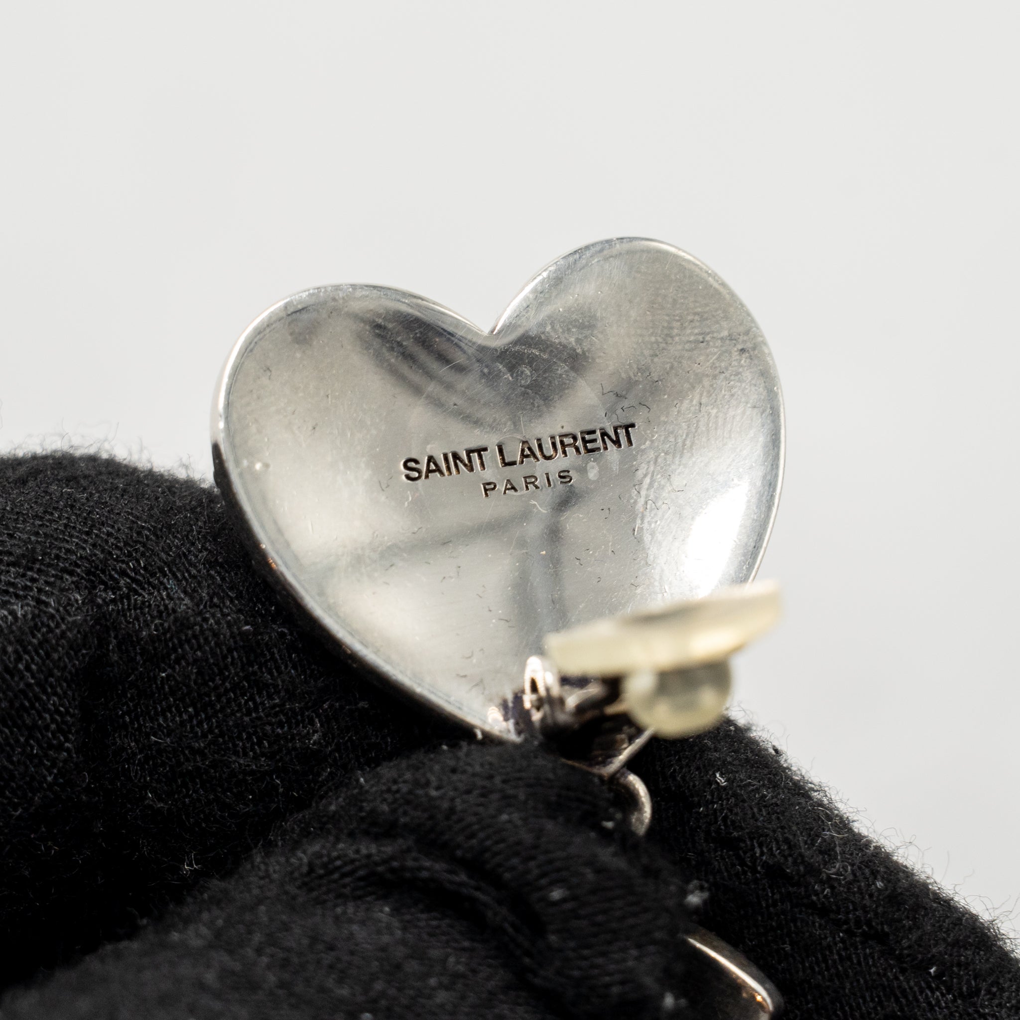 SAINT LAURENT HEART AND LETTER EAR CLIPS SILVER TONE