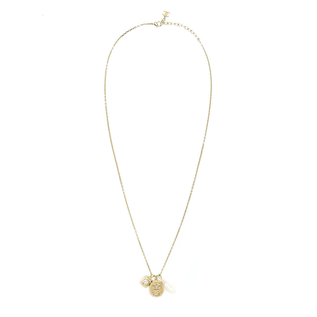 CHANEL 21A METAL PLATE AND CRYSTAL NECKLACE BRUSHED GOLD TONE