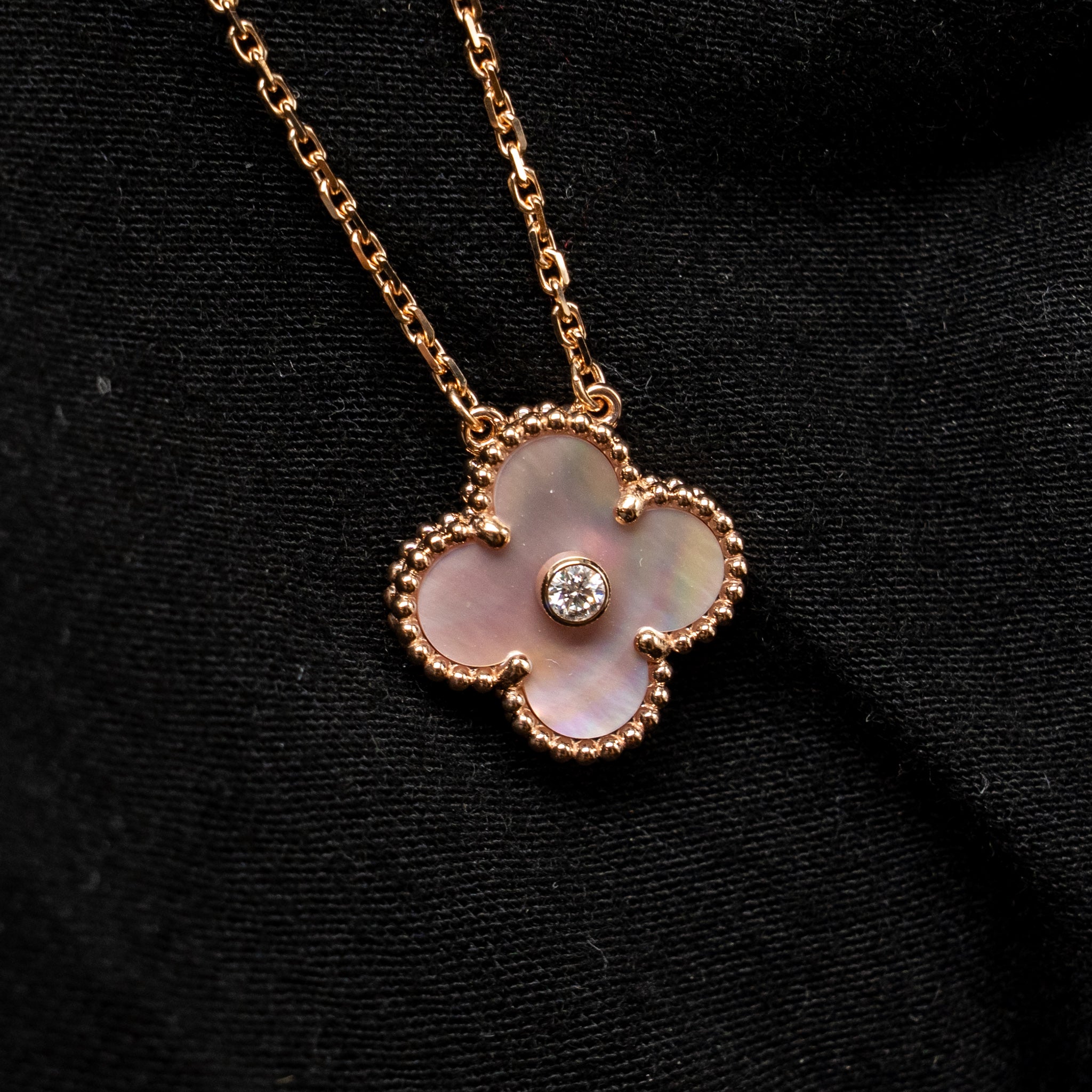 VAN CLEEF AND ARPELS AND ARPELS 2025 HOLIDAY PENDANT PINK MOTHER OF PEARL ROSE GOLD WITH DIAMOND