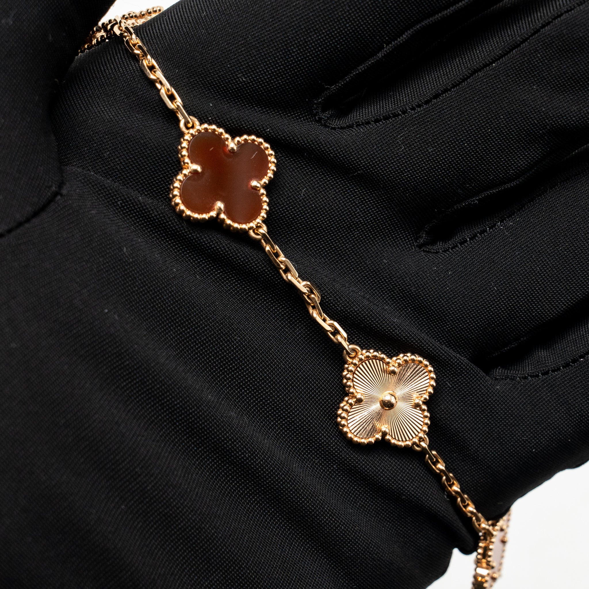 VAN CLEEF & ARPELS VINTAGE ALHAMBRA BRACELET, 5 MOTIFS, GUILLOCHE, ROSE GOLD, CARNELIAN