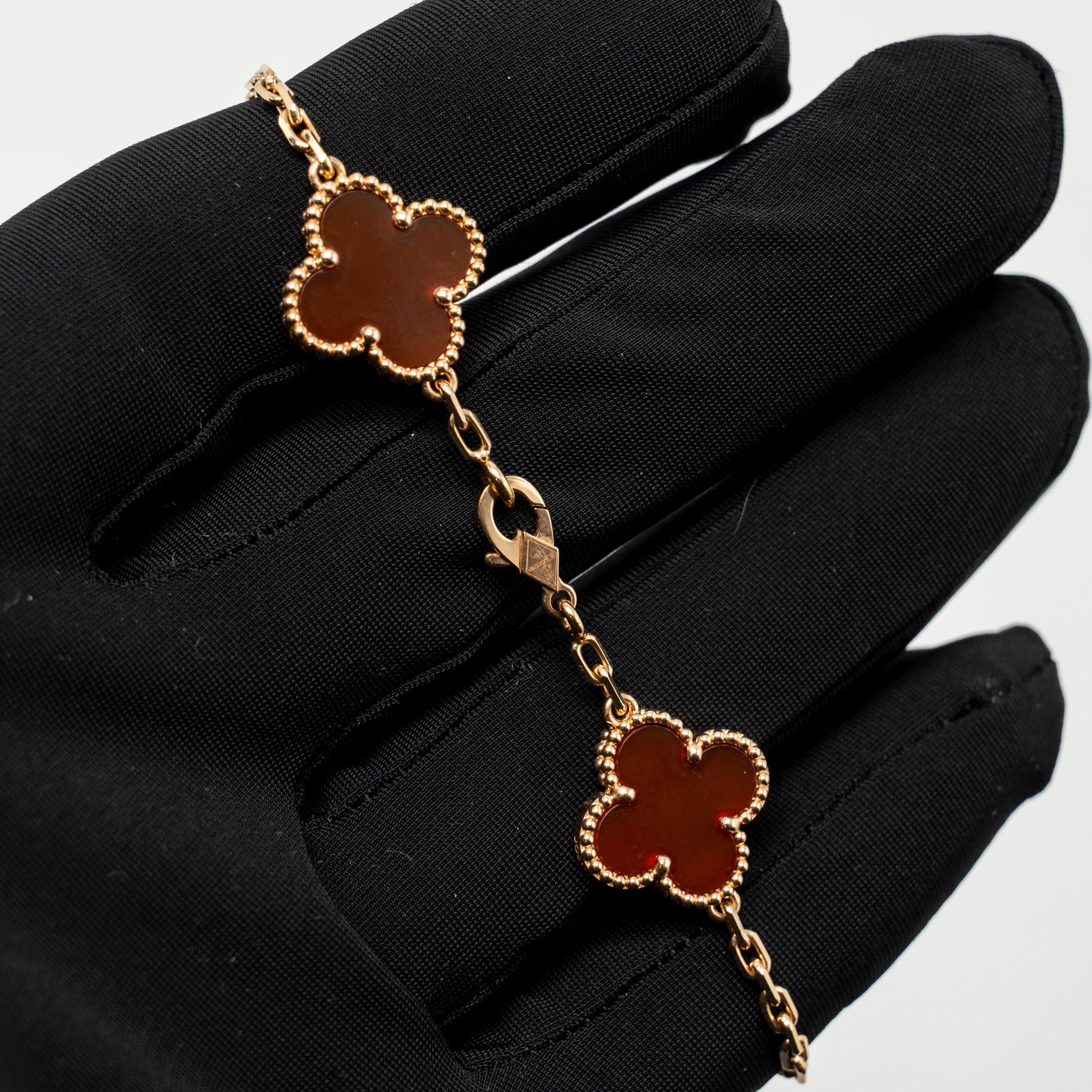 VAN CLEEF & ARPELS VINTAGE ALHAMBRA BRACELET, 5 MOTIFS, GUILLOCHE, ROSE GOLD, CARNELIAN