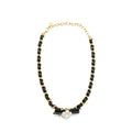 CHANEL CHAIN NECKLACE WITH CC LOGO AND CAMELLIAS