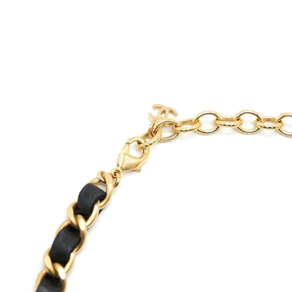 CHANEL CHAIN NECKLACE WITH CC LOGO AND CAMELLIAS