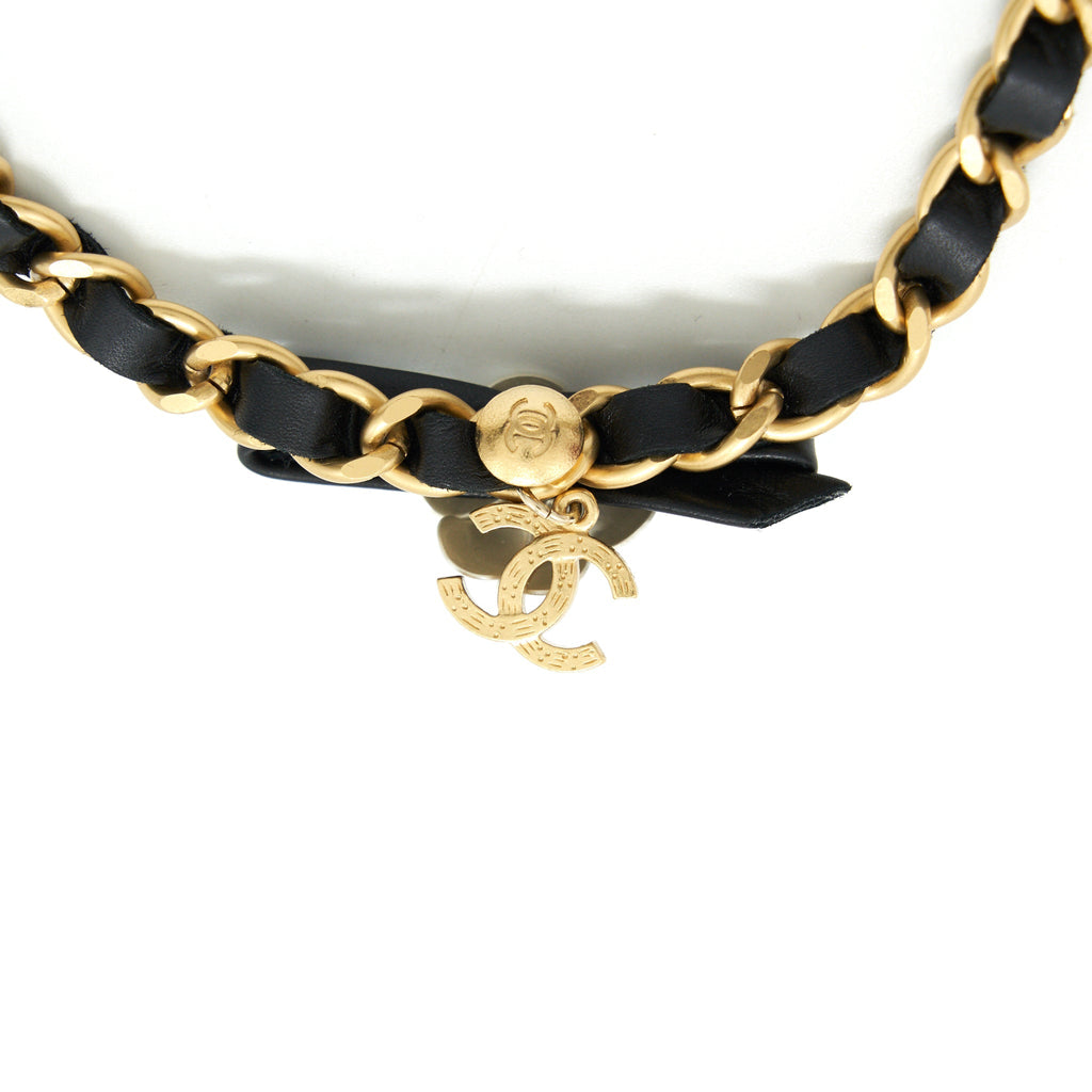 CHANEL CHAIN NECKLACE WITH CC LOGO AND CAMELLIAS