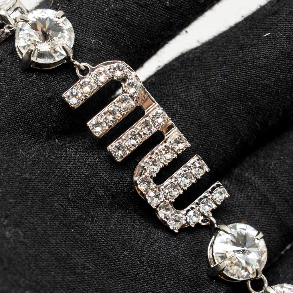 MIU MIU LOGO CRYSTAL-EMBELLISHED BRACELET SILVER TONE