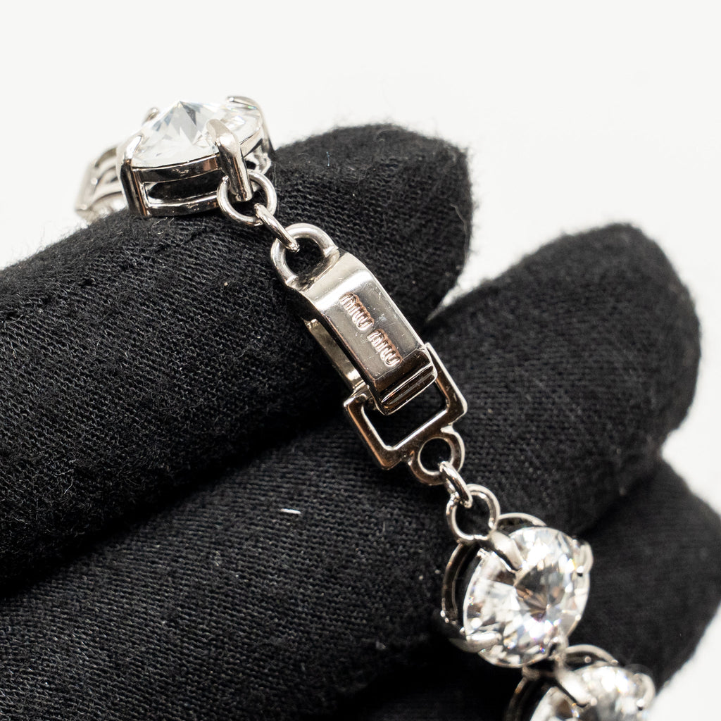 MIU MIU LOGO CRYSTAL-EMBELLISHED BRACELET SILVER TONE
