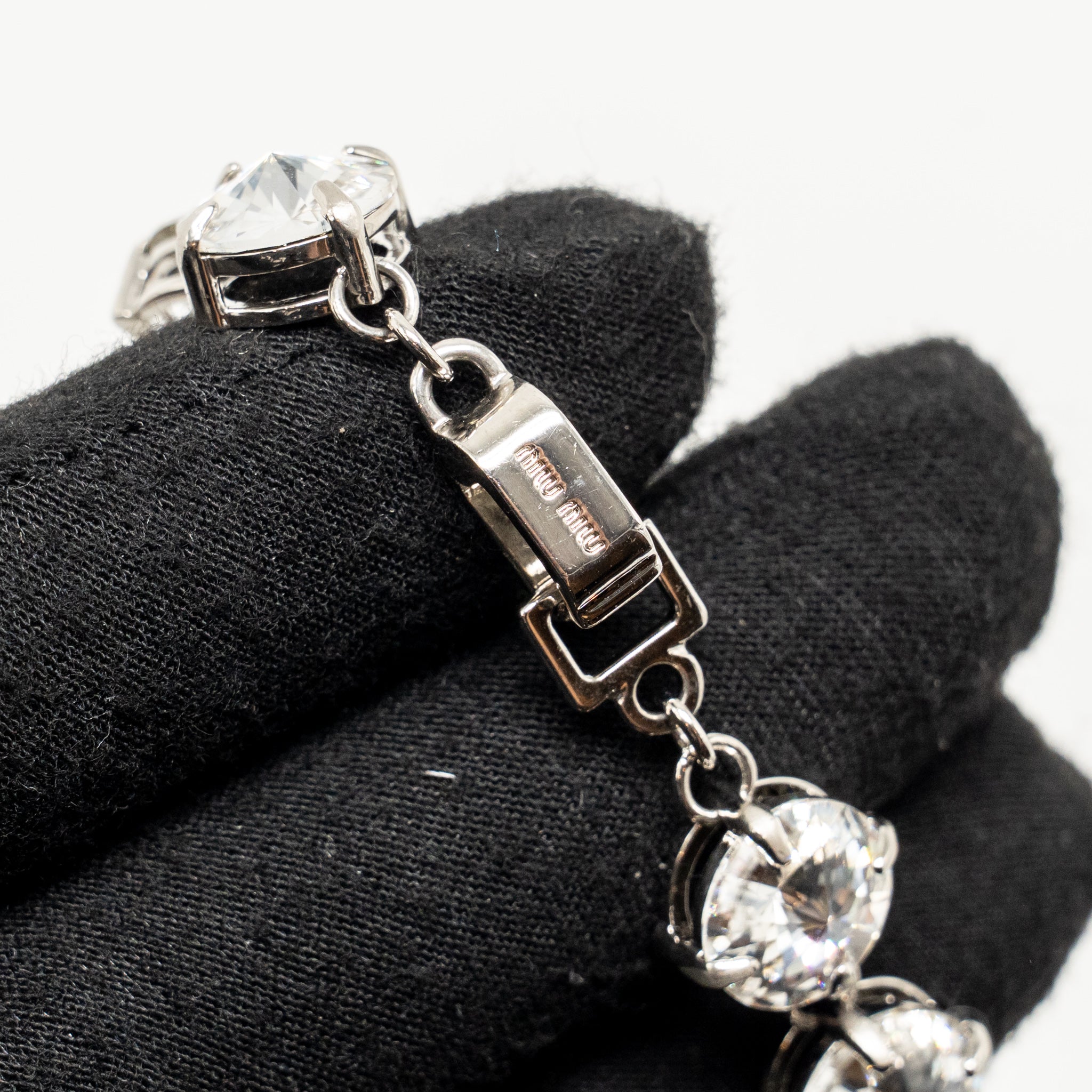 MIU MIU LOGO CRYSTAL-EMBELLISHED BRACELET SILVER TONE