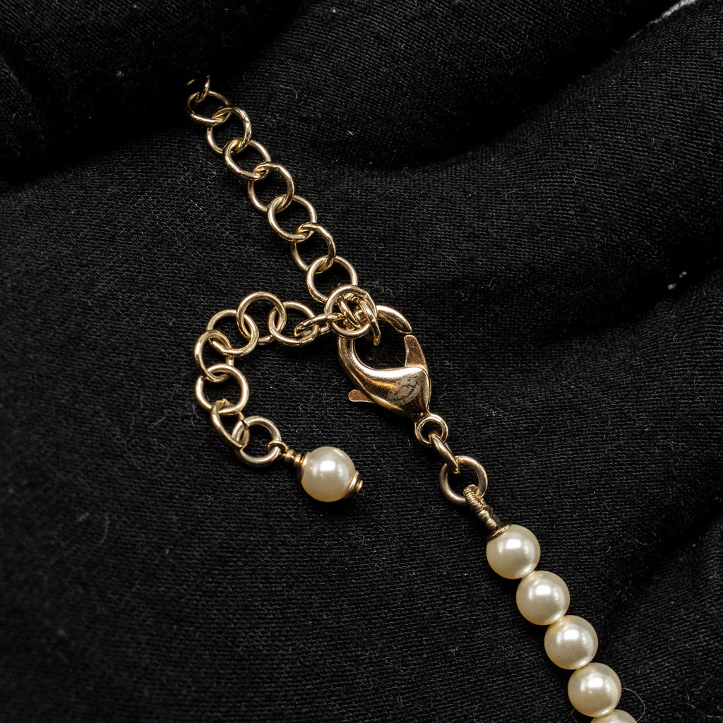 CHANEL LETTER LOGO NECKLACE CRYSTAL/PEARL LIGHT GOLD TONE