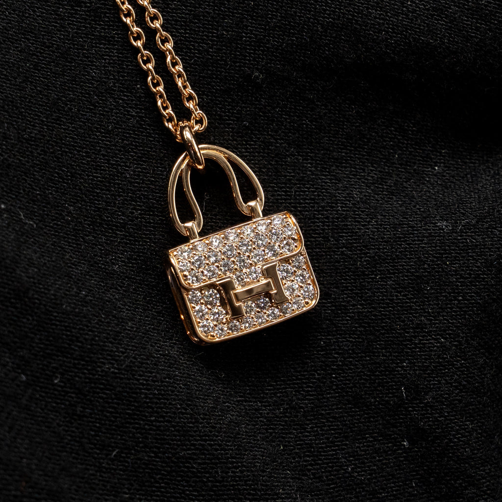 HERMES CONSTANCE AMULETTE PENDANT ROSE GOLD WITH DIAMONDS