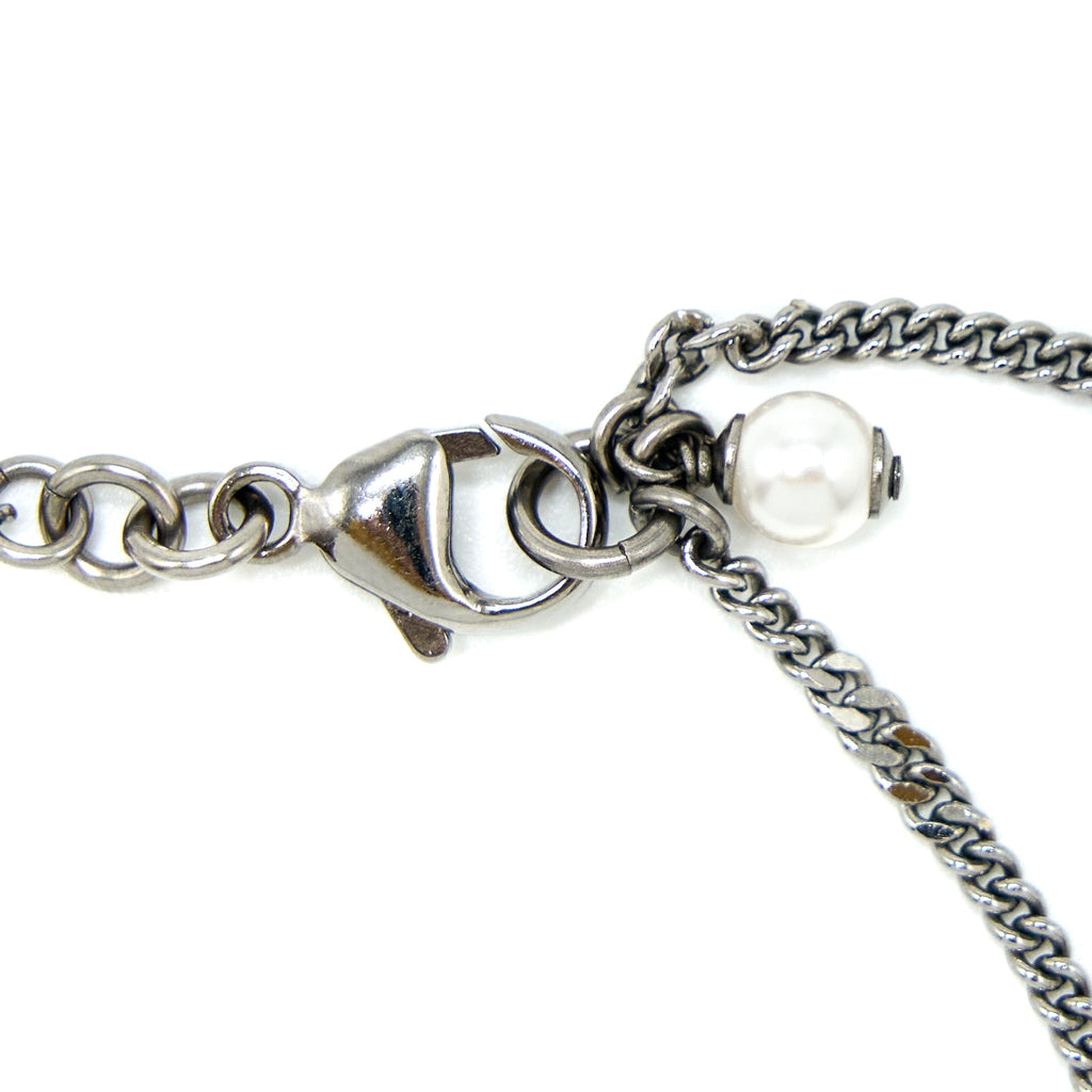 CHANEL CC LOGO AND A STAR NECKLACE SILVER TONE