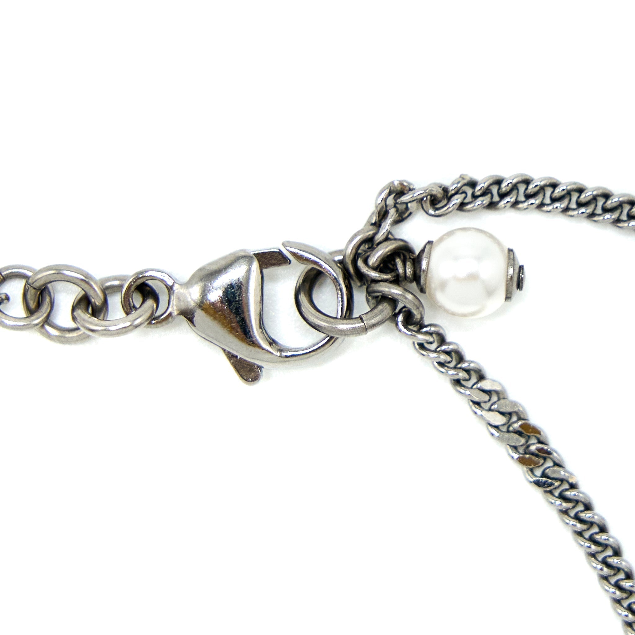 CHANEL CC LOGO AND A STAR NECKLACE SILVER TONE