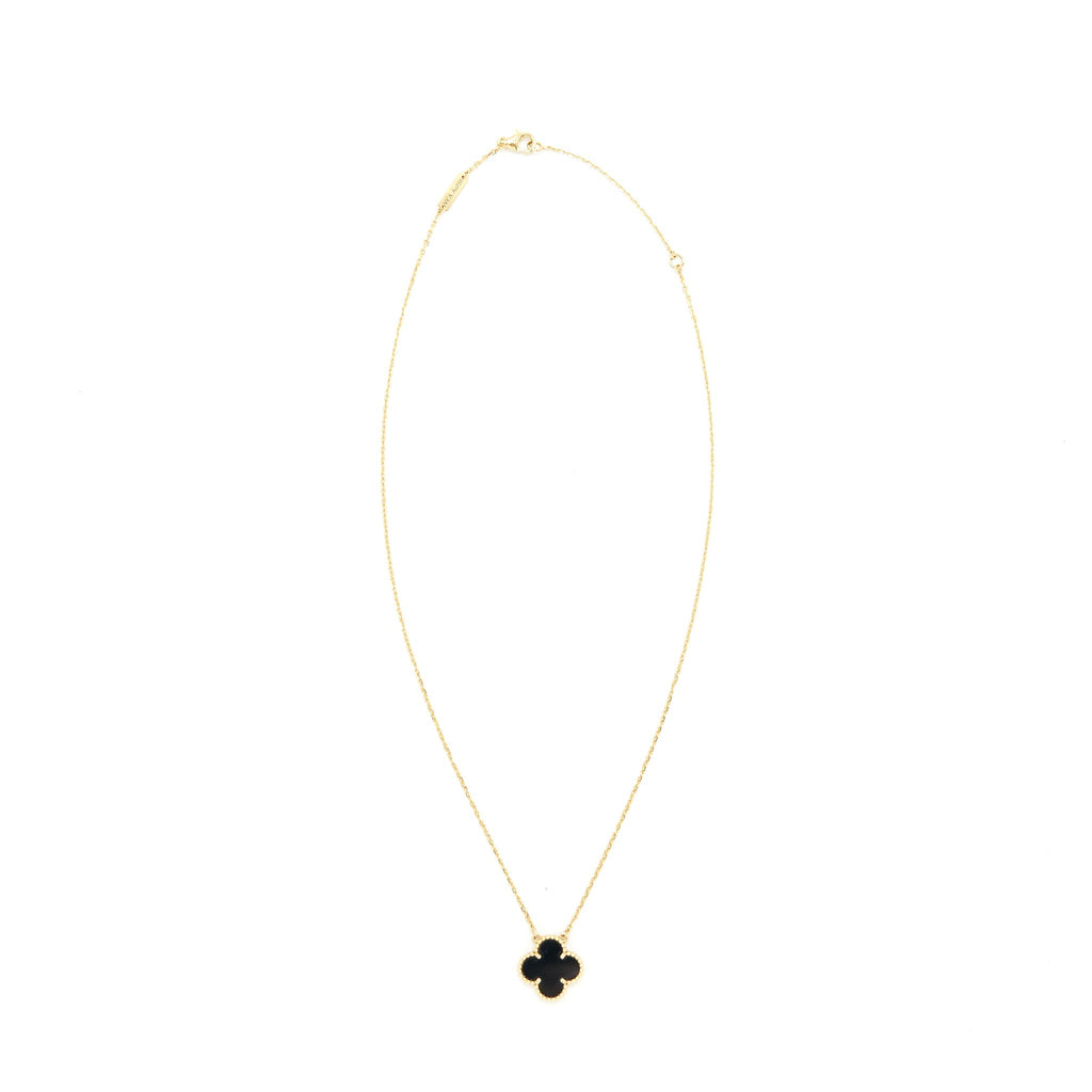 VAN CLEEF & ARPELS VINTAGE ALHAMBRA PENDANT ONYX AND YELLOW GOLD