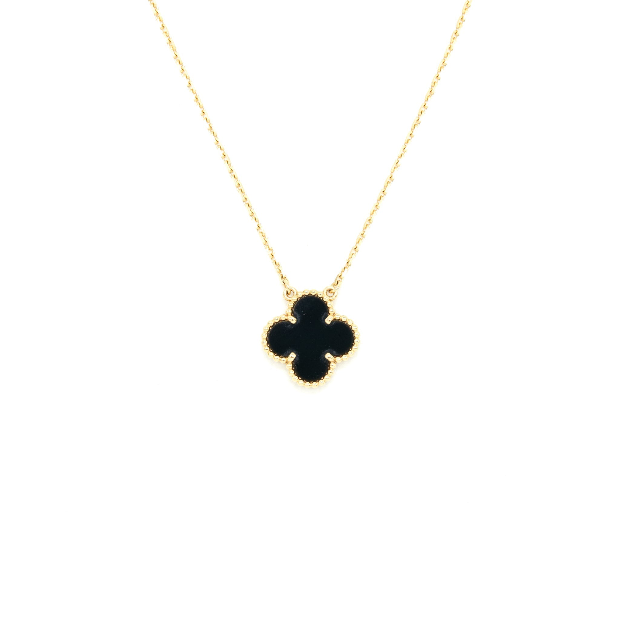 VAN CLEEF & ARPELS VINTAGE ALHAMBRA PENDANT ONYX AND YELLOW GOLD