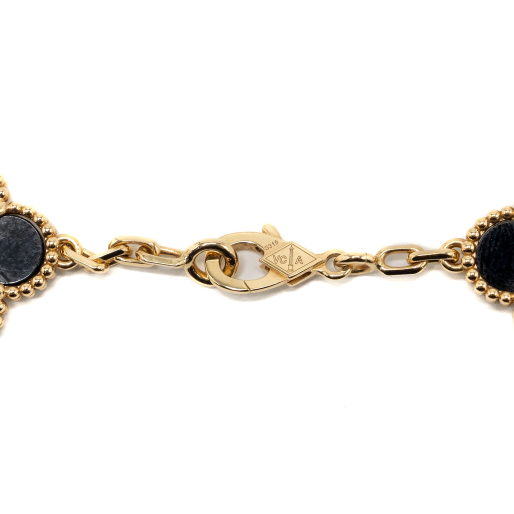 VAN CLEEF & ARPELS VINTAGE ALHAMBRA 10-MOTIF PENDANT ONYX YELLOW GOLD