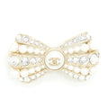 CHANEL BOW BROOCH WITH PEARLS AND CRYSTALS LGHW