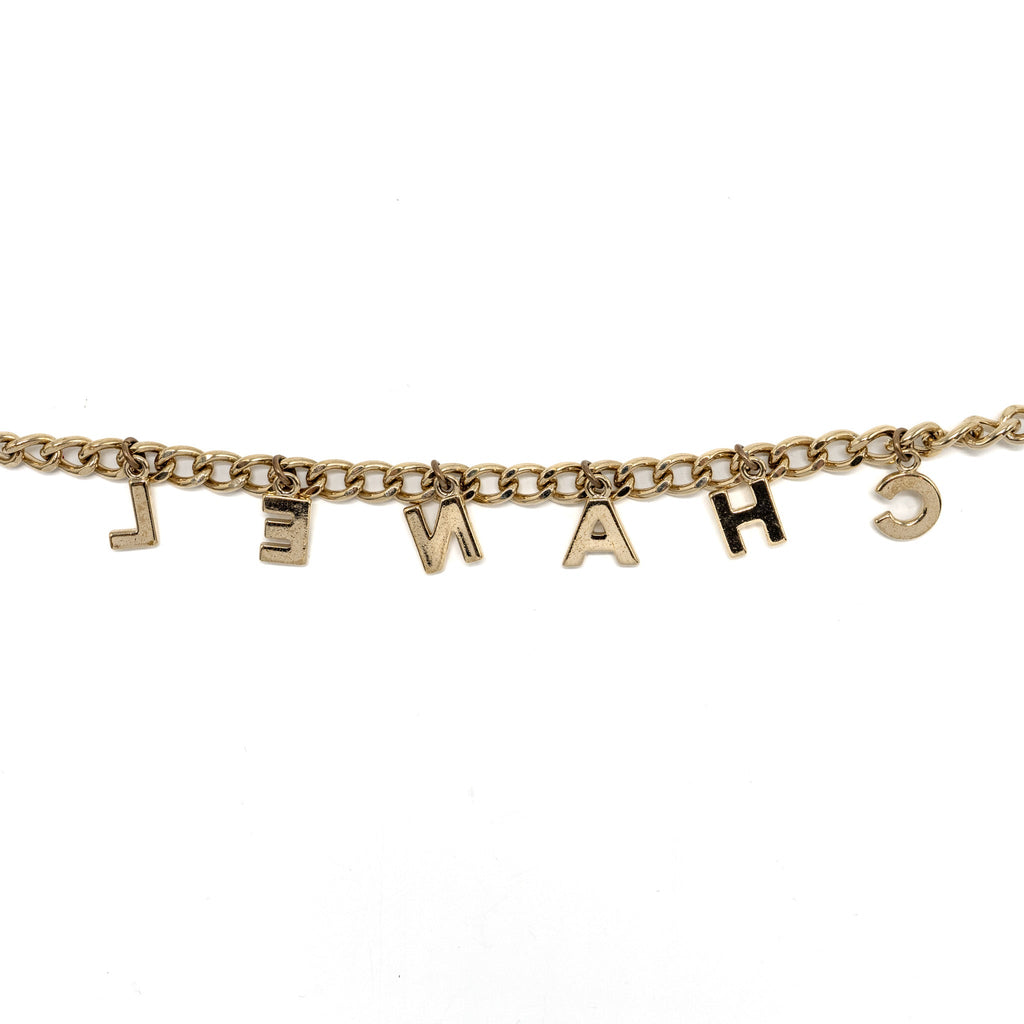 CHANEL LETTER DROP CHAIN BELT LIGHT GOLD TONE