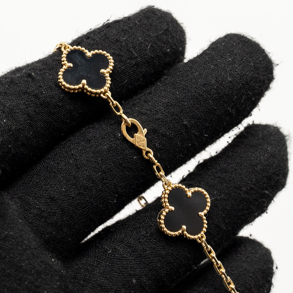 VAN CLEEF & ARPELS VINTAGE ALHAMBRA BRACELET 5 MOTIFS YELLOW GOLD, ONYX